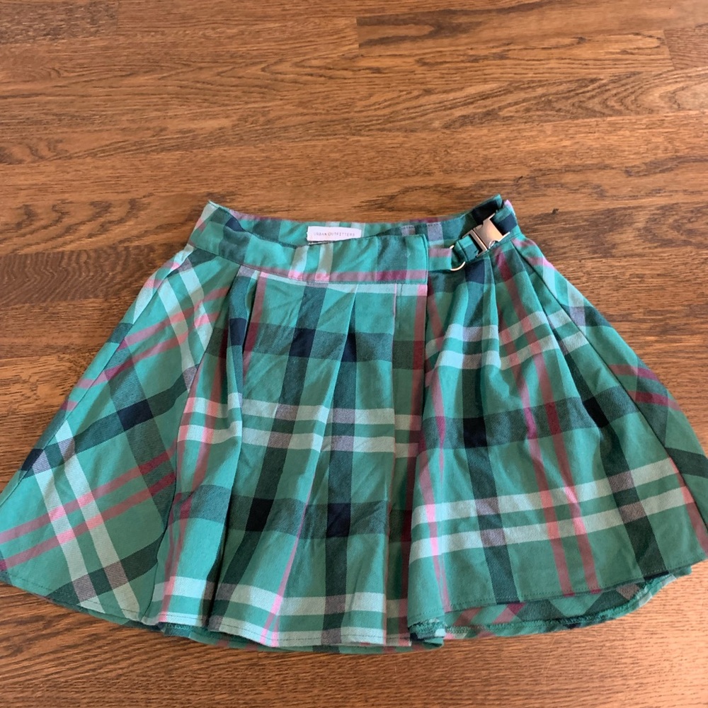 Green woman’s mini skirt from Urban Outfitters size small
